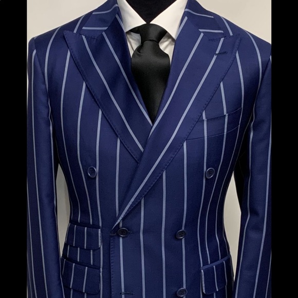 Spectacular blue with pinstripe double breasted super 150 cerruti wool suit.